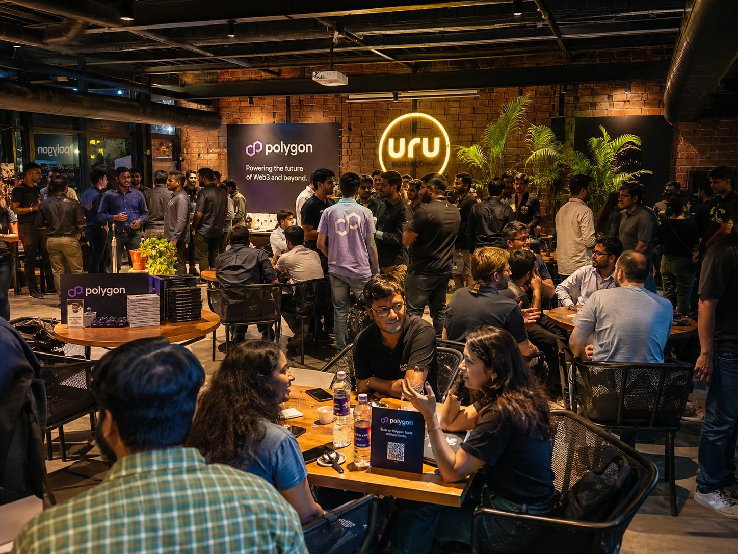 A render of a full sponsor
              takeover of the URU room: branded backdrop, table cards and merchandise through a
              busy evening crowd.